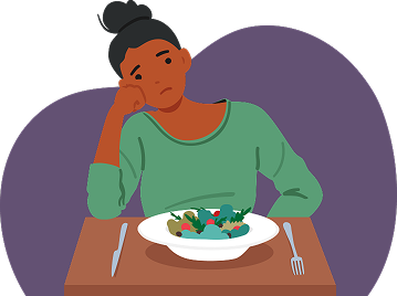 Woman looking at a healthy meal